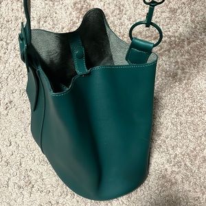 green across the should handbag